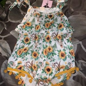 Baby girl romper with sunflower print